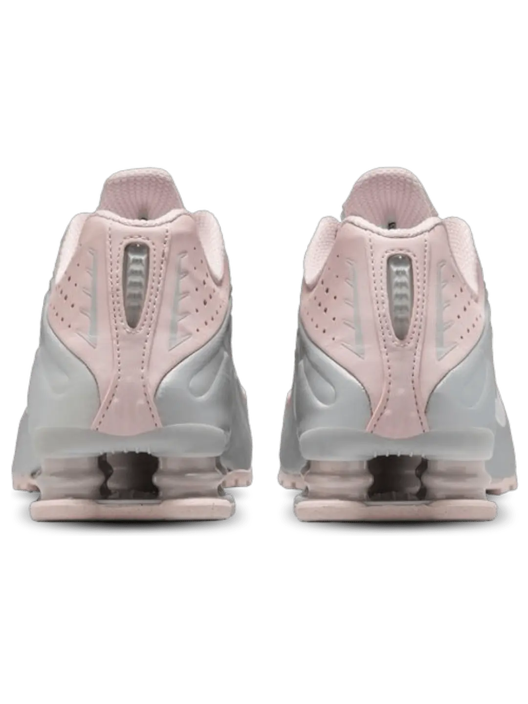 Solado do Nike Shox R4 Rosa com sistema de amortecimento visível e base antiderrapante.

Além do desempenho técnico, o visual futurista e a paleta de cores fazem do Shox R4 uma opção versátil, que combina com looks esportivos, casuais e até streetwear